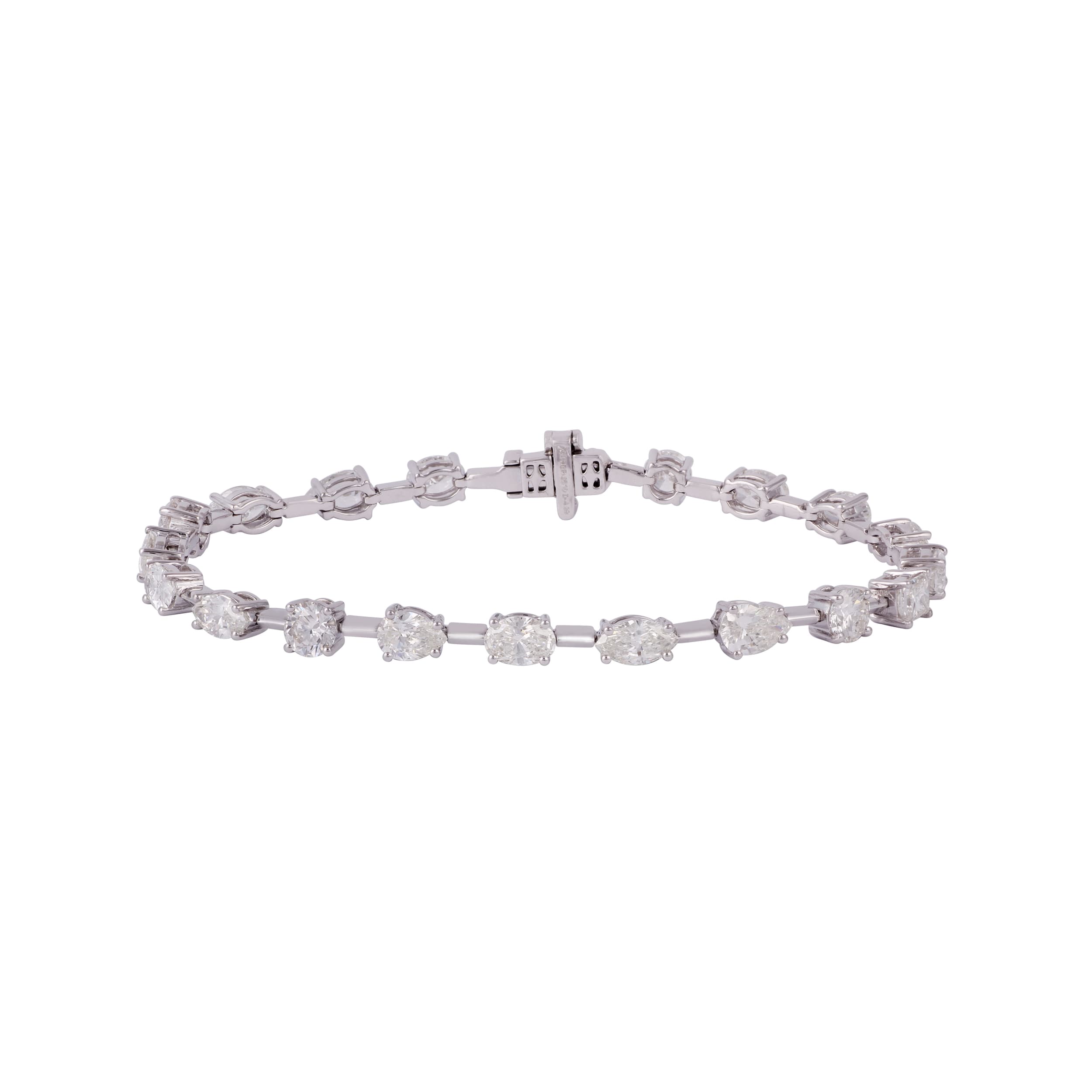Pulsera de línea en oro blanco con diamantes pera, óvalo, redondo y marquesa alternados