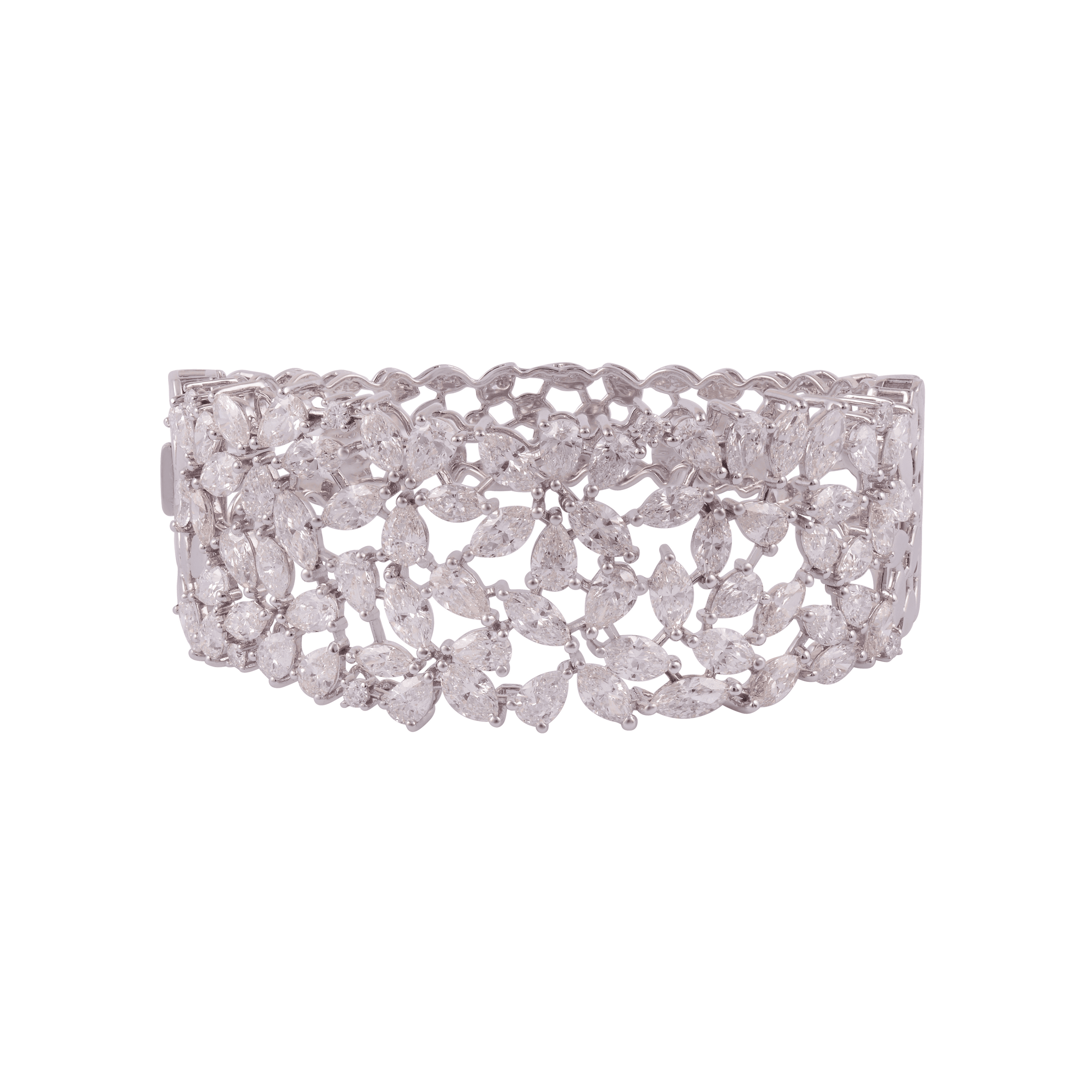 Wide white gold bangle set with interlocking sprays of marquise and pear diamonds