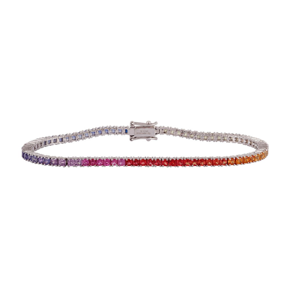 White gold tennis bracelet set with a continuous spectrum of square-cut sapphires