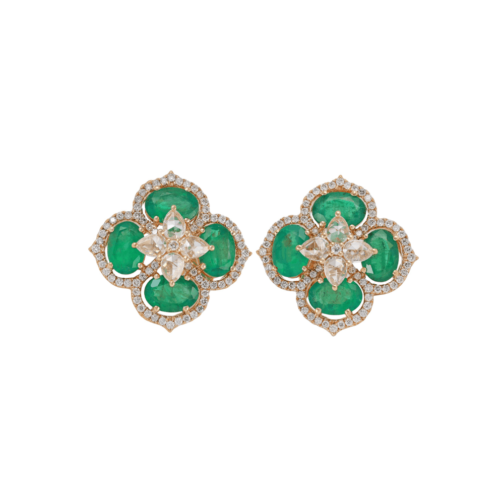 Yellow gold quatrefoil earrings with four oval emeralds inside a scalloped diamond border