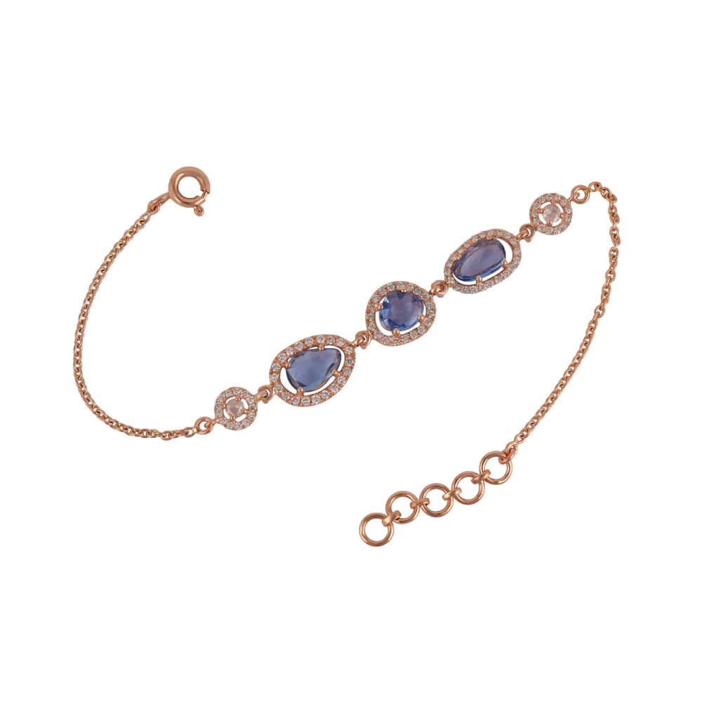 Fine rose gold chain bracelet with three haloed rose-cut blue sapphire stations
