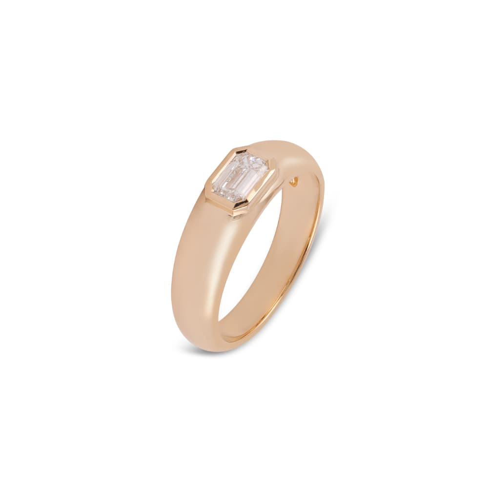 Domed rose gold band ring with one emerald-cut diamond flush-set into the crest